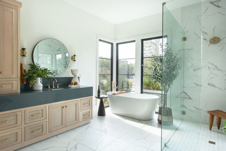 Primary bath with a soaking tub and glass shower