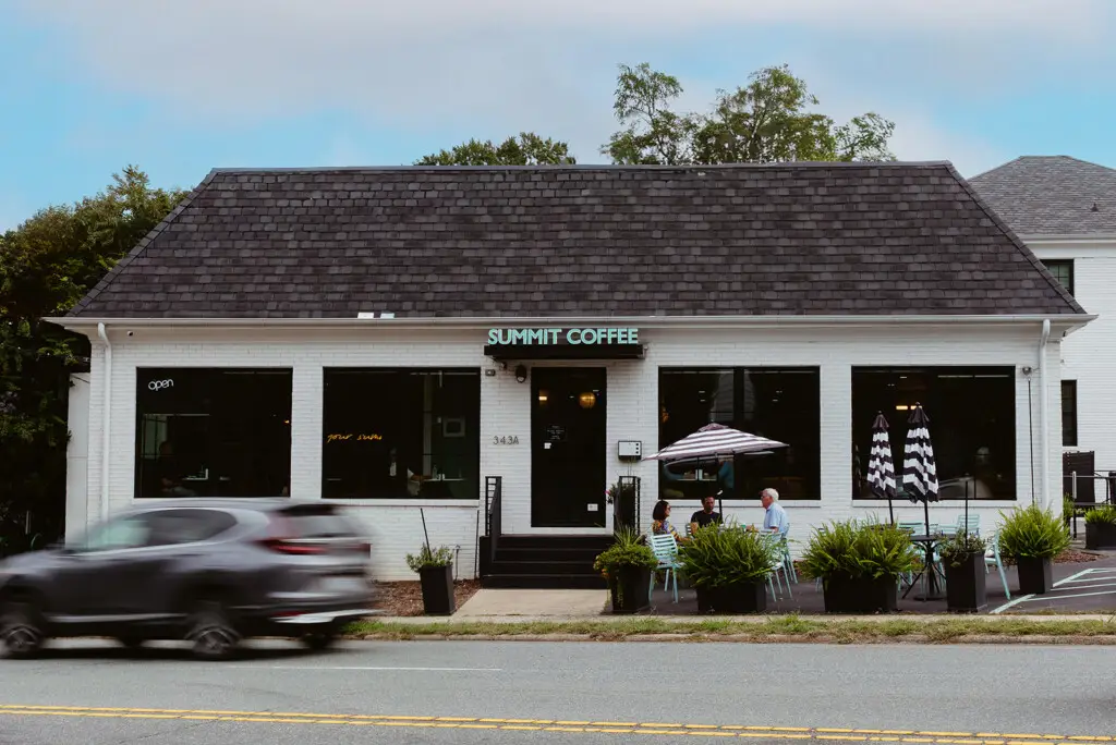 Neighborhood coffee shop storefront on a quiet street