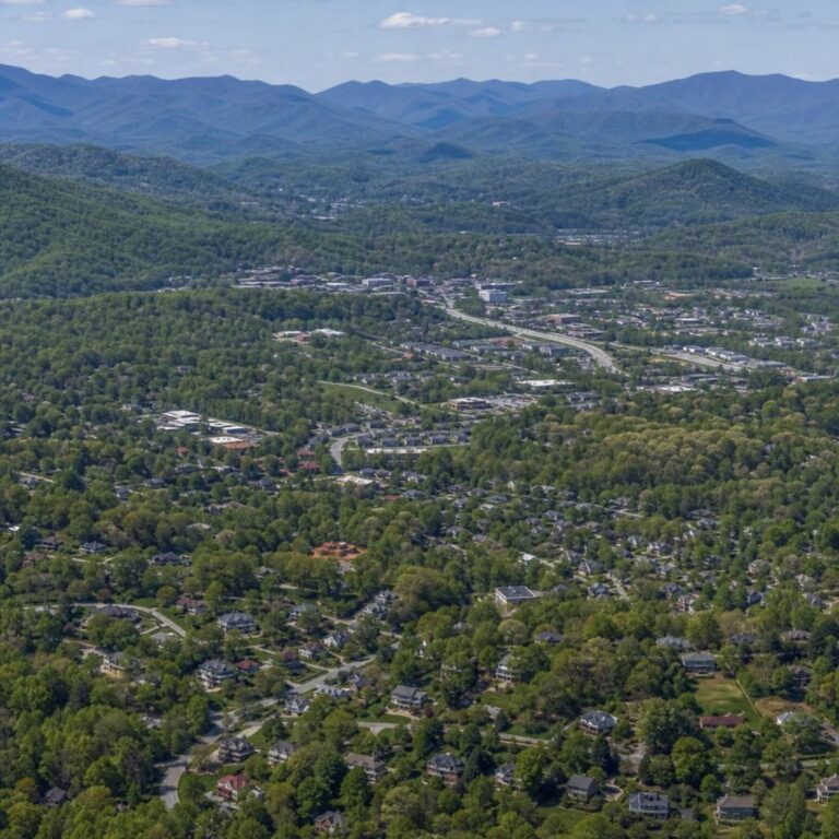 Aerial view of a mountain town and valley near Asheville, NC