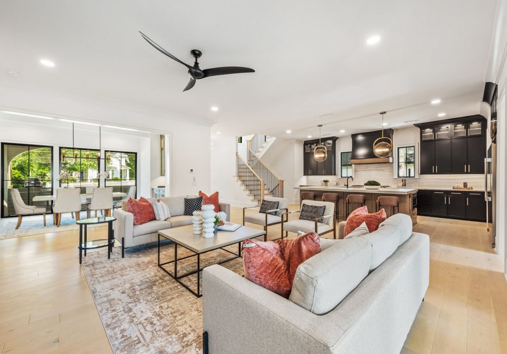 Open living room and kitchen in a Tetra at Laurel home