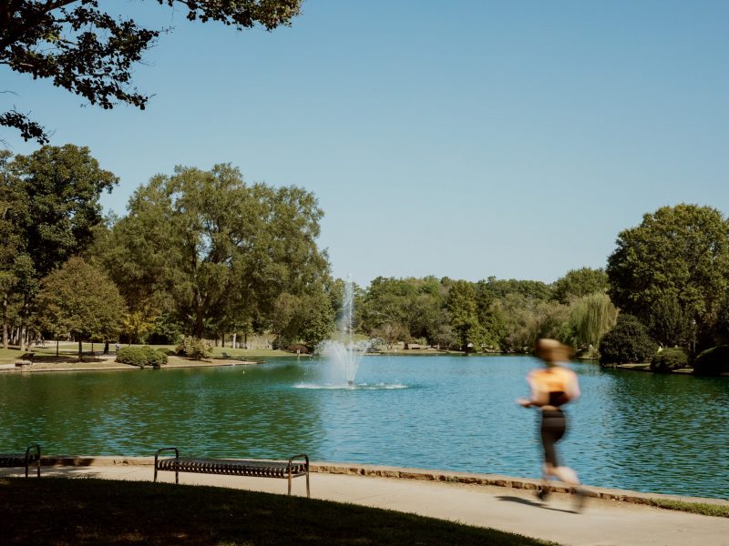 Runner by the lake at Freedom Park in Charlotte