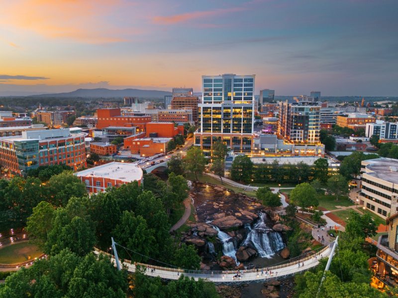 Greenville, South Carolina at Falls Park on Reedy Creek at dusk.